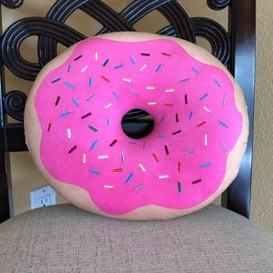Donut emoji plush pillow.